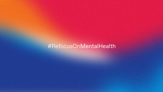 Hashtag text on a multicolored background reads "refocus on mental health"